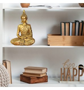  statue bouddha sanci sur une console d’entrée avec des accessoires naturels