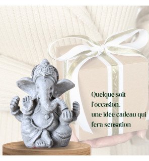  ganesh en métal gris entouré de plantes vertes pour une touche naturelle