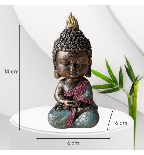  bébé bodhi vert utilisé comme objet déco sur un bureau
