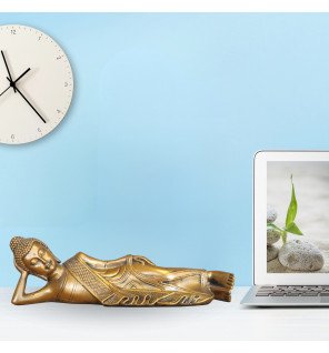  statue bouddha couchée mise en scène dans un salon moderne pour une touche d’exotisme