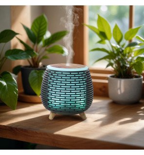 tony diffuseur d'huiles essentielles ultrasonique usb zen'arôme posé sur une table de salon moderne