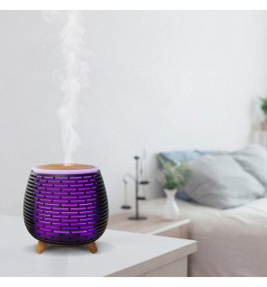  tony diffuseur usb placé sur une table de chevet dans une chambre cosy