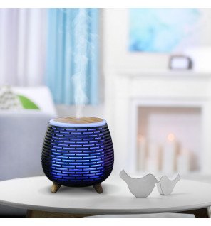  ambiance zen avec le diffuseur tony posé sur une étagère en bois clair