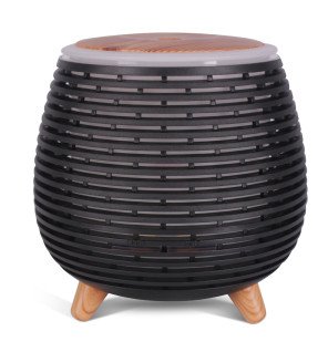  diffuseur d’huiles essentielles tony posé près d’une plante verte pour une ambiance naturelle