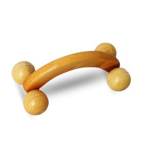 roue de massage en bois sun&sia posée sur une serviette