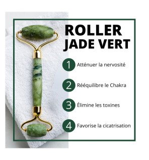 rouleaux masseur en jade vert à côté d’une bougie parfumée pour une atmosphère relaxante