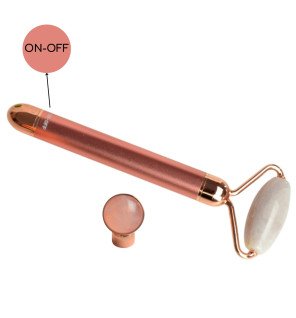 détail du bouton d’allumage du masseur visage électrique