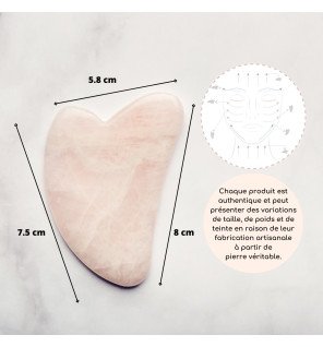 accessoire de massage visage en quartz rose sur fond neutre pour mise en valeur du produit