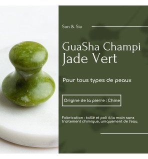 ambiance zen avec le gua sha posé à côté d’une serviette blanche