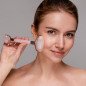 Masseur roller visage en quartz rose Masseur roller visage en quartz rose