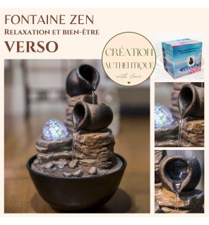  vue rapprochée de l'eau s'écoulant sur les galets décoratifs de la fontaine