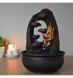  fontaine mystic bouddha avec lumière allumée créant une atmosphère chaleureuse