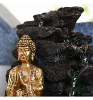  fontaine d'intérieur bouddha shira placée sur un meuble en bois clair