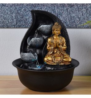  détail de la base de la fontaine bouddha avec galets décoratifs