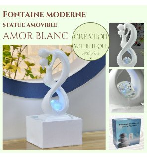  fontaine décorative blanche avec boule de verre illuminée diffusant une lumière douce