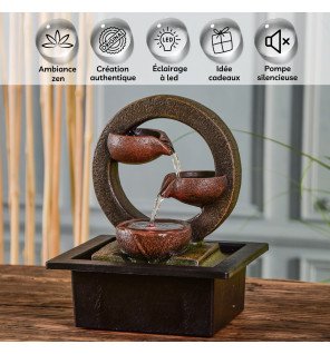  fontaine terai installée dans un coin lecture pour une atmosphère sereine et propice à la détente