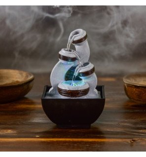  fontaine d'intérieur en fonctionnement créant une atmosphère relaxante dans une pièce