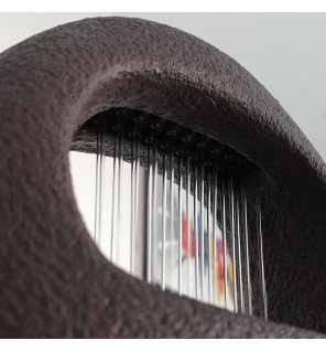  détail du rideau de pluie illuminé créant une ambiance relaxante dans une pièce