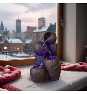  fontaine zen luba avec éclairage led allumé créant une ambiance relaxante dans un séjour