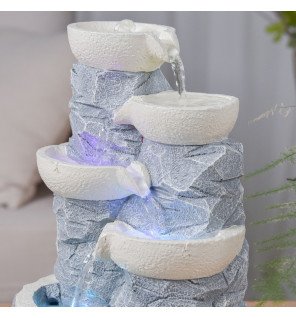  ambiance cocooning avec la fontaine zen'light ganda allumée en soirée