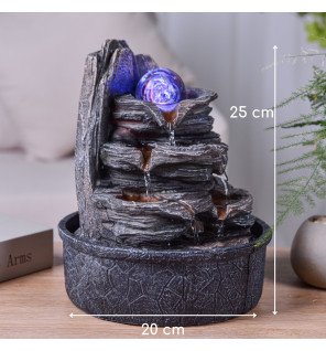  fontaine d'intérieur zen avec éclairage led diffusant une lumière douce