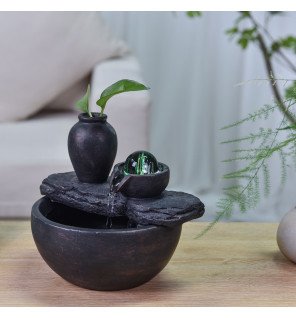  fontaine d'intérieur zen avec éclairage led bleu pour une ambiance nocturne