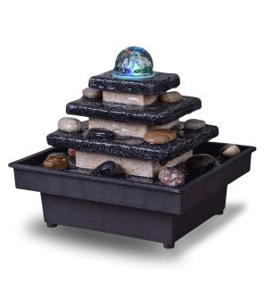 fontaine zen utilisée lors d'une séance de relaxation pour créer un environnement propice au bien-être