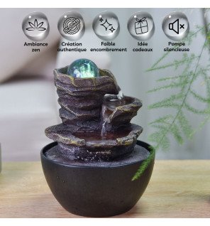  fontaine d'intérieur en fonctionnement avec éclairage doux pour espace de méditation
