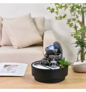  ambiance cocooning avec la fontaine zen'light allumée en soirée