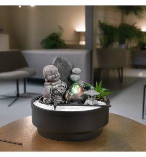  fontaine zen avec éclairage led diffusant une lumière douce dans une ambiance relaxante