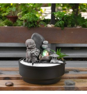  ambiance tamisée créée par la lumière led de la fontaine au crépuscule