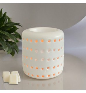  vue rapprochée du brûle-parfum coliseo blanc avec détails de la matière lisse et brillante