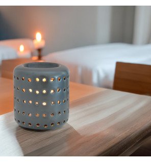  brûle-parfum noir dans une ambiance cocooning