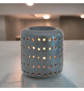  diffuseur coliseo noir avec décoration végétale autour