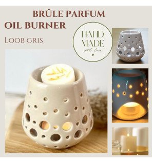  ambiance zen avec le brûle-parfum allumé et une légère vapeur parfumée s’échappant du réservoir