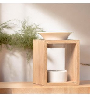  vue latérale du brûle-parfum arina mettant en valeur son design épuré et ses courbes douces