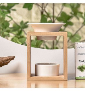  diffuseur arina utilisé lors d’un moment de détente avec un livre et une tasse de thé