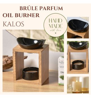  ambiance zen avec le brûle-parfum kalos placé à côté de bougies et de galets décoratifs
