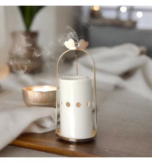  contraste des matières céramique et métal du brûle-parfum