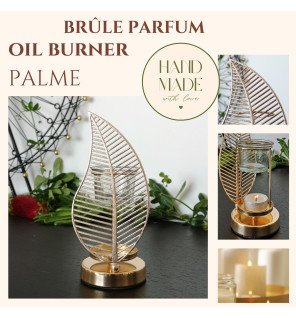  détail du brûle-parfum palme avec motifs ajourés et finition élégante