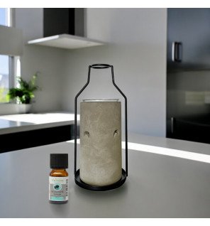  détail du support en métal noir du brûle-parfum