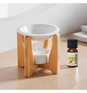  détail du brûle-parfum montrant la flamme de la bougie et la diffusion du parfum