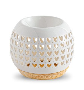  brûle-parfum en céramique blanche dans une ambiance zen et épurée pour la détente