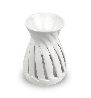  brûle-parfum corta blanc présenté dans un intérieur moderne aux tons neutres