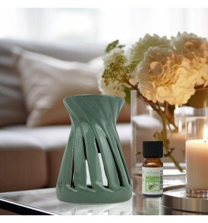  vue latérale du brûle-parfum mettant en valeur sa forme arrondie et sa couleur apaisante