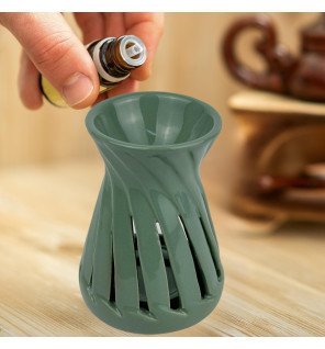  détail du réservoir à parfum du brûle-parfum corta vert