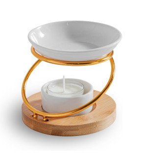  brûle-parfum hula de zen'arôme placé près d’une plante verte pour une ambiance naturelle