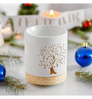  mise en scène du brûle-parfum céramy à côté d’une bougie allumée pour une ambiance cocooning