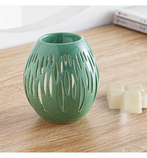  brûle-parfum céramy accompagné d’accessoires bien-être comme des galets et des bougies