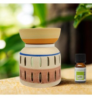  brûle-parfum creativity avec une légère fumée parfumée s’en échappant